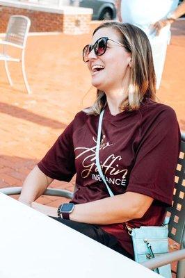 My coworker in one of our staff shirts