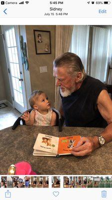My granddaughter and father communicating. My dad has severe loss. He wears Oticon OpN 1 and can hear His great granddaughter.