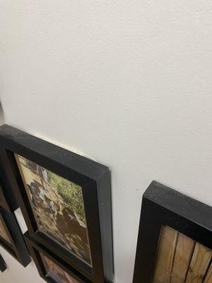 Dust on top of photographs that was not dealt with