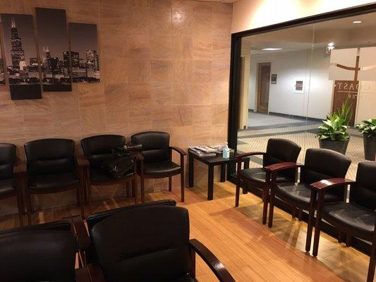 The waiting room with some fancy Chicago photos