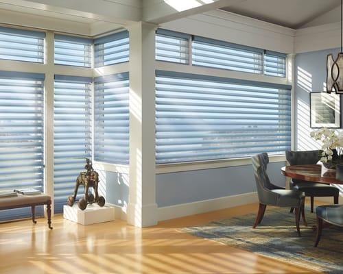 Hunter Douglas light filtering 3" Silhouette shades.