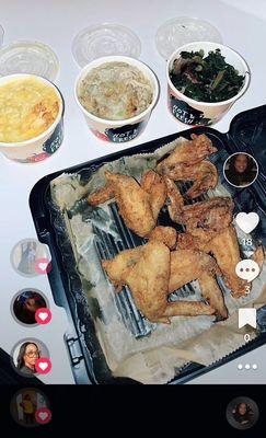 Fried chicken wings, mac and cheese, dressing and greens