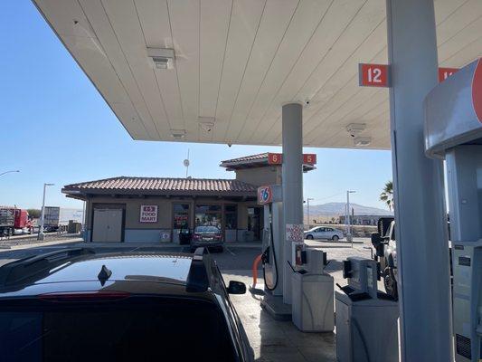 Looking from the pumps to the store