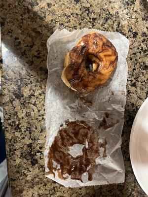 Chocolate iced donut with the icing stuck to the wrapper!!!