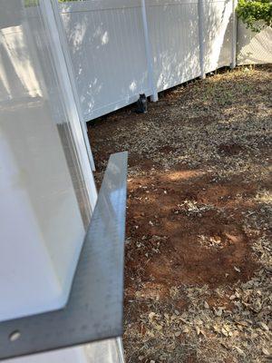 this picture shows the severe angle of the post in relation to being perpendicular