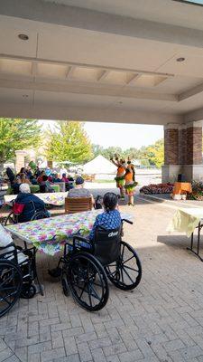 Luau Party outside for residents with a live performance, tropical fruits and an amazing dinner.