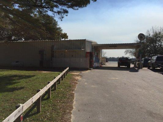 Bathrooms are located outside on the north side of the building.