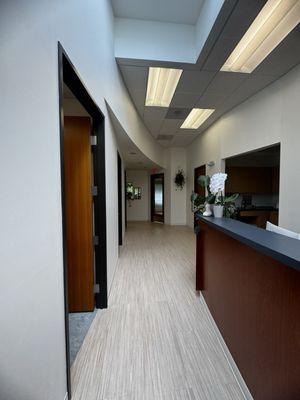 Treatment rooms and desk. Open and bright