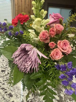 One day old droopy and wilted flowers. Sat out in the heat for 90 minutes before I noticed them on our doorstep.