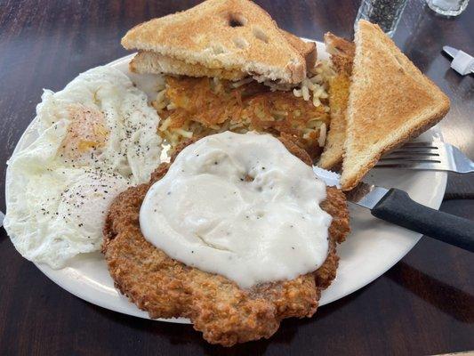 Country fried steak. Asked for hash browns instead of their classic home fries. Eggs over-easy. With white bread toast.