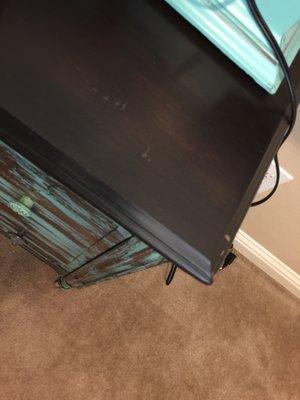 Vanity with deep scratches made by them