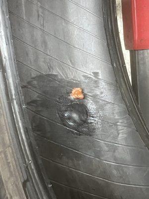 Bad Patch up. Looks like bubble gum inside of the tire. This is what he wanted $100 for.