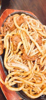 Sautéed beef over sizzling pan