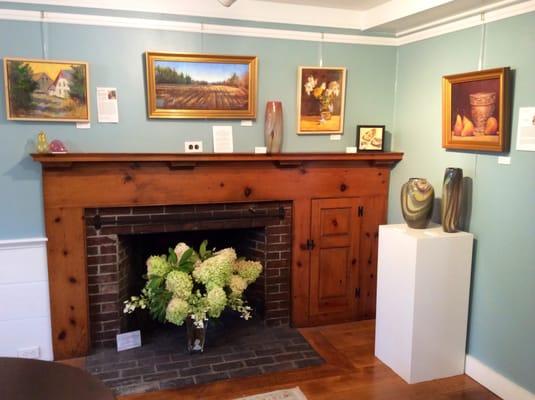 Paintings by Aline Ordman and Susan Carey; glass by McDermott Glass Studio