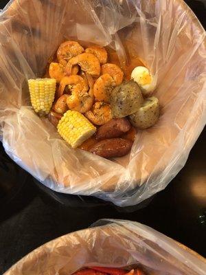 1/2 lb Shrimp boil tossed in medium Cajun sauce