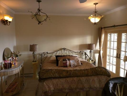 Tuscan style bedroom with private terrace and gorgeous view of the lake