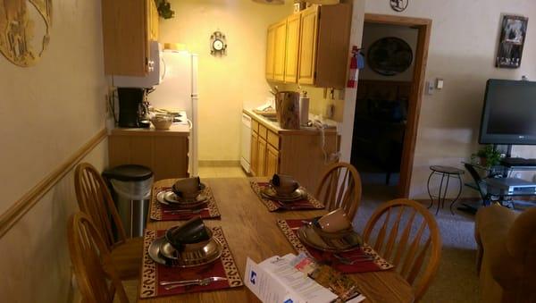 Dining room and kitchen area in room 324 (2 bedroom, 2 bath condo).