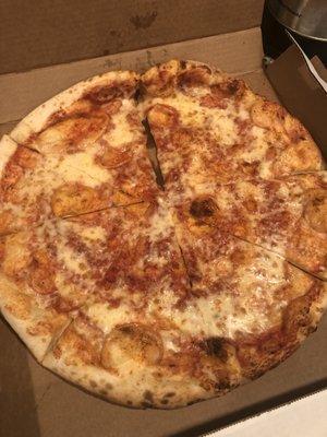 soggy, floppy, cheese melted to the box