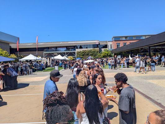 This is a 1-HOUR PLUS line to get a drink that was supposed to be included in the price of admission.