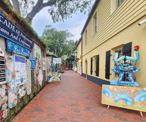 The shop is down this alley to the right.