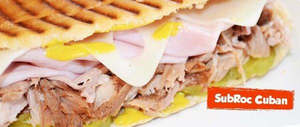 Our delicious Cuban Panini with smoked ham, roasted pork, Swiss cheese, pickles and mustard. Pressed and serve hot. Small taste of Havana!