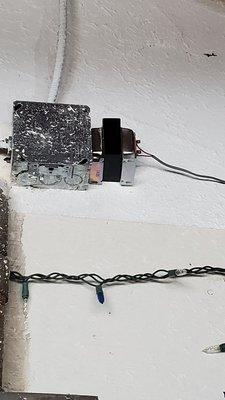 On right is new transformer installed next to existing junction box.