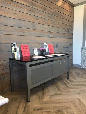 Pamphlets and forms for vehicle registration.