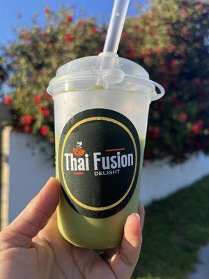 What's in this photo you ask...my complementary Green Thai Tea with my Pad See ew order