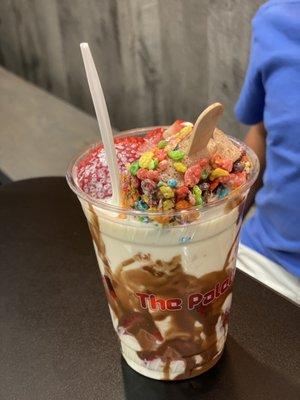 Kit-Kat Paleta dipped in milk chocolate and fruity pebbles with strawberry cream