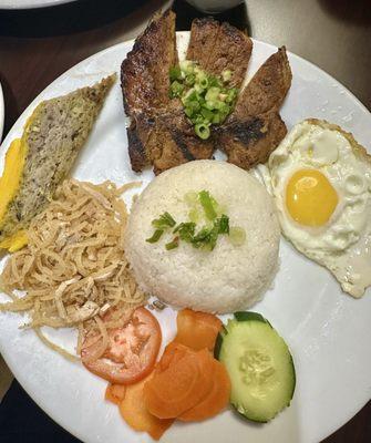 Com tam suon bi cha ( rice place with pork chop, steamed egg cake and shredded pork skin)