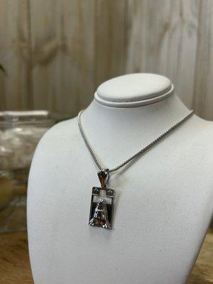 New silver piece! Ask our jeweler for this prayer hand necklace in silver.