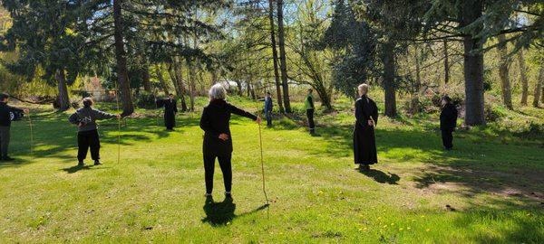Qi Gong outside, last spring. Anshin leads Qi Gong every Saturday morning.