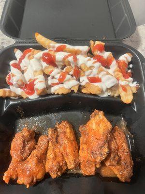 8 piece hot lemon pepper wings and fries.