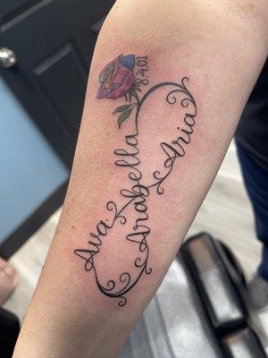 Etched In Ink Tattoo