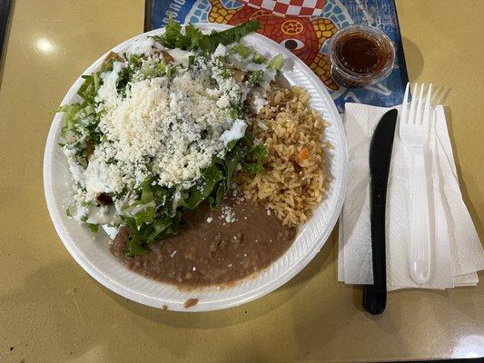 Flautas meal - Rice, beans, and 6 flautas topped with lots of lettuce and cheese.