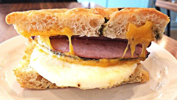 Sandwich crafted at The Flying Joe, bread made at All Crumbs; Basil Focaccia, ham, egg and cheese