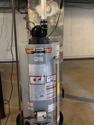 Gas power vented water heater