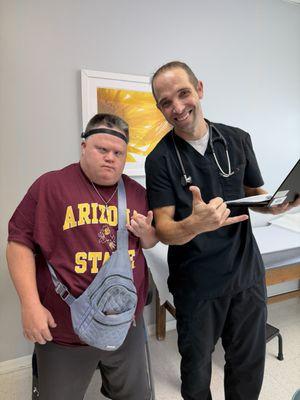 Doctor giving thumbs up.