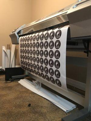 Our wide format printer hard at work fulfilling a large sticker order