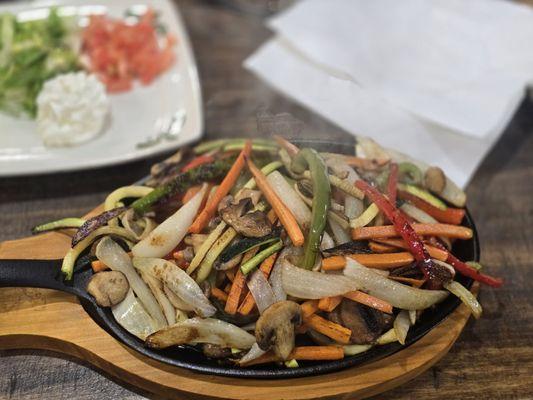 Vegetarian fajitas - my regular order - in a new presentation. Love it. My favorite place became favoriter!
