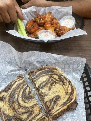 $25.00 a very small Reuben and 10 wings a piece of celery