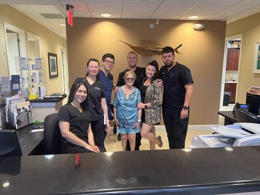 AFAS Team with a happy patient