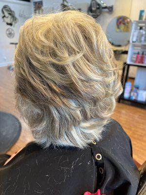 Short haircut with highlights and lowlights