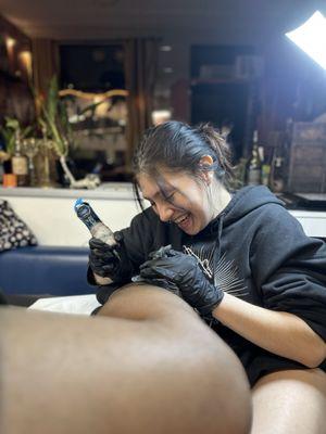 Brisa working on my tattoo