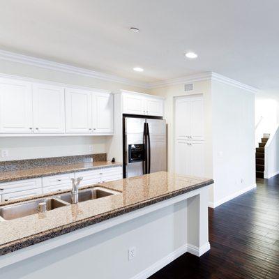 Here's another view from the laundry room out to the kitchen with some of our living room.