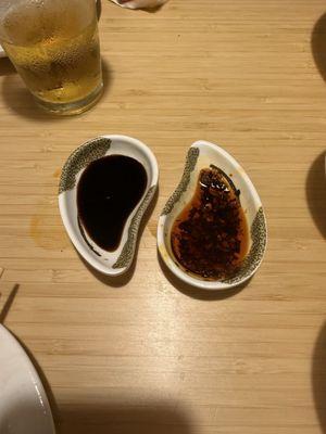 Soy sauce and chili oil, just ask your sever for it.