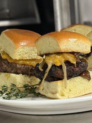 Trio of Mini Beef Sliders served with Aged Cheddar, Caramelized Onion, Pickles and our secret "Juicy" Sauce