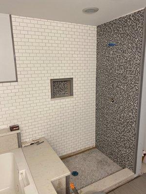 Bathroom remodel : I requested tile change and bench added to existing bathroom, changed to glass and subway tile! Love the outcome!
