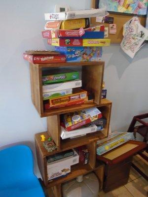A stack of games in back for the kiddos.