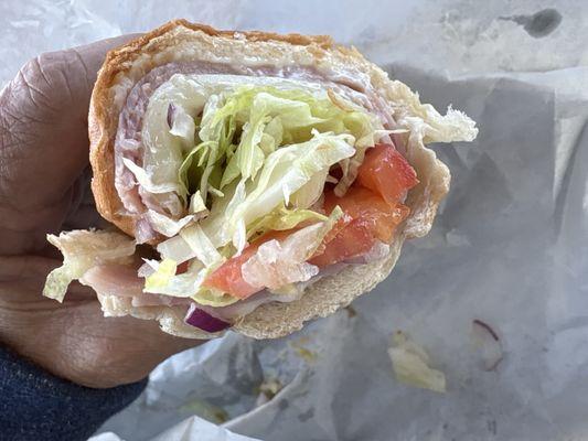 Best grinder it is stuffed with all fresh lettuce, tomato provolone ham onion